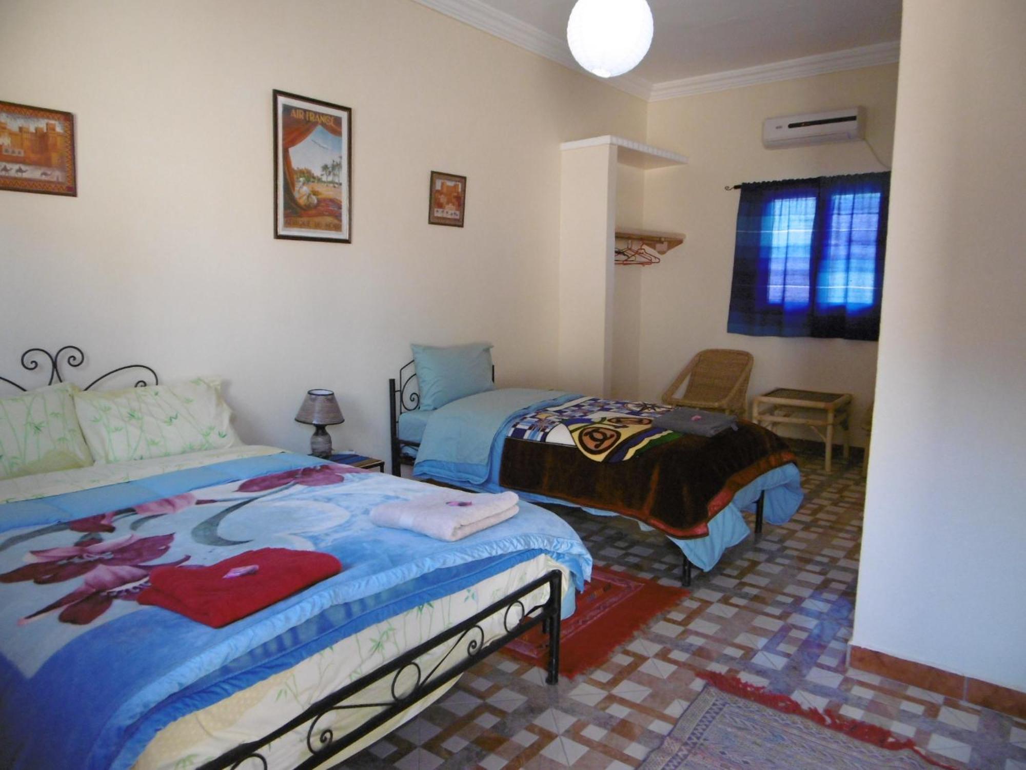 Palmeraie Guest House Тингир Номер фото