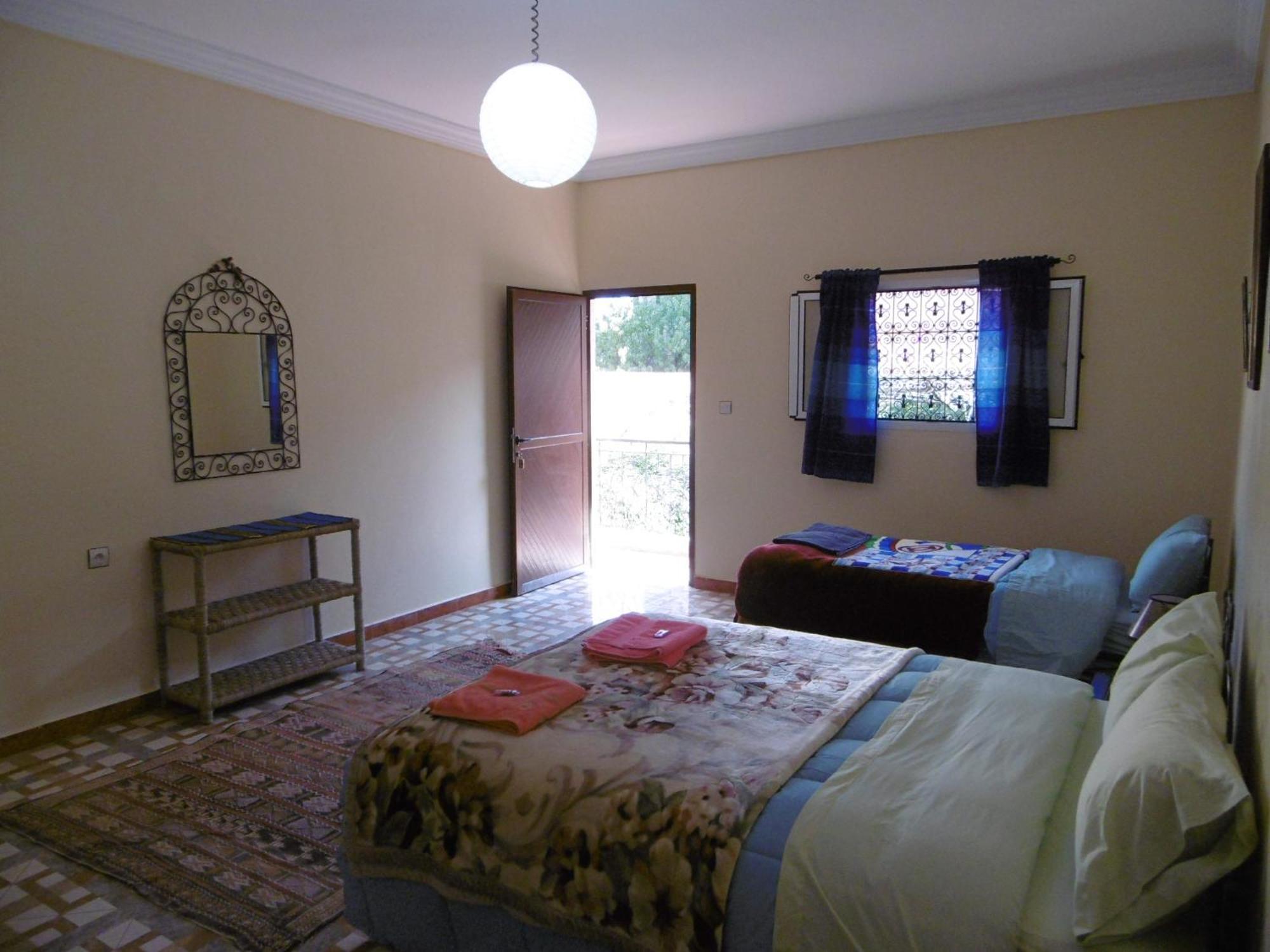 Palmeraie Guest House Тингир Номер фото